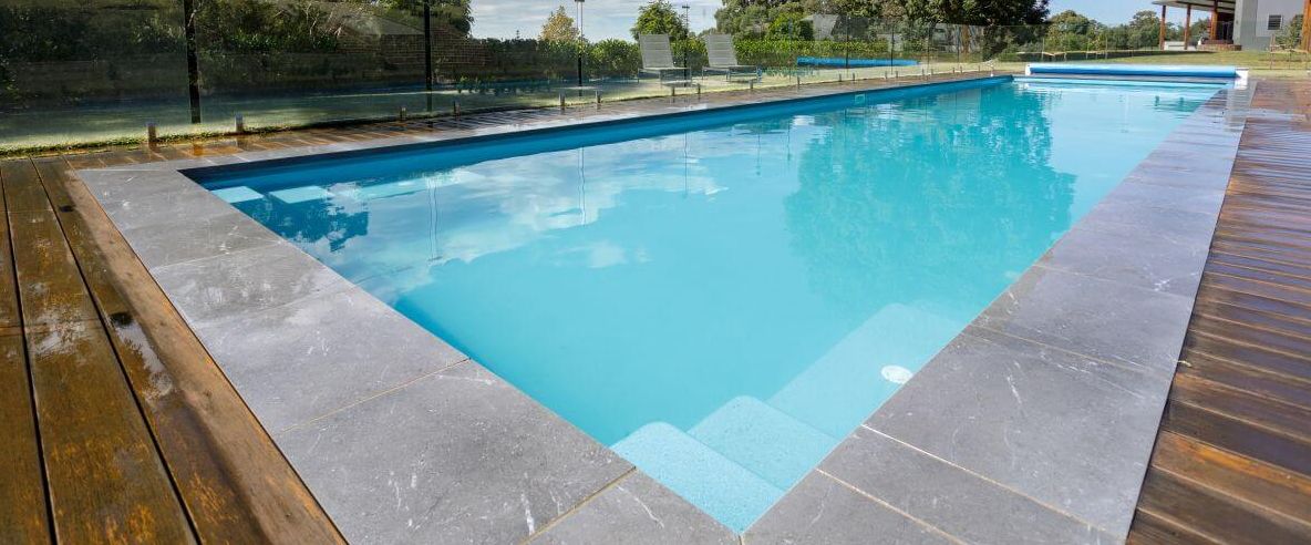 Contemporary 16.6m custom in colour Evolution with thermal pool cover Compass Pools Australia Contemporary Pool Cover Pool Rollers