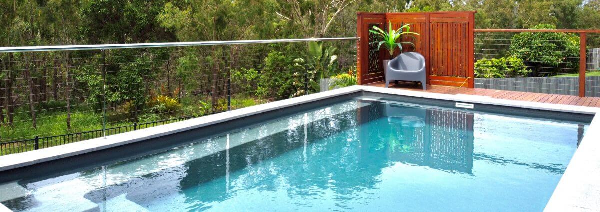 7m Sanctuary in colour Evolution with mix and match pool fencing. Pool installed by Composite Pools Compass Pools Australia Sanctuary 7m Evolution Composite Pools