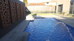 Vogue 8.2 Royal blue colour fibreglass pool installation in Melbourne VIC 02