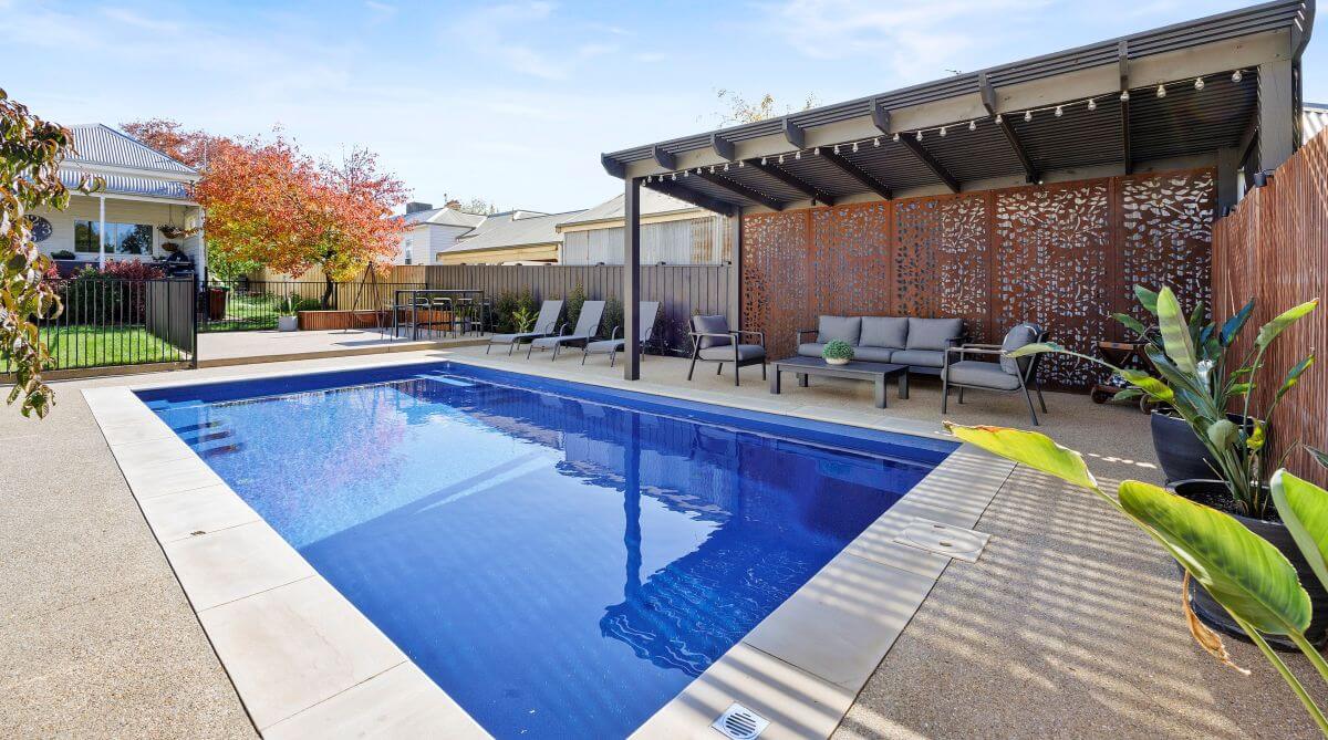 8.2m X Trainer in colour Pacific with mix and match fencing. Installed by Bridgeswade. Compass Pools Australia X Trainer 8.2m Pacific Bridgeswade