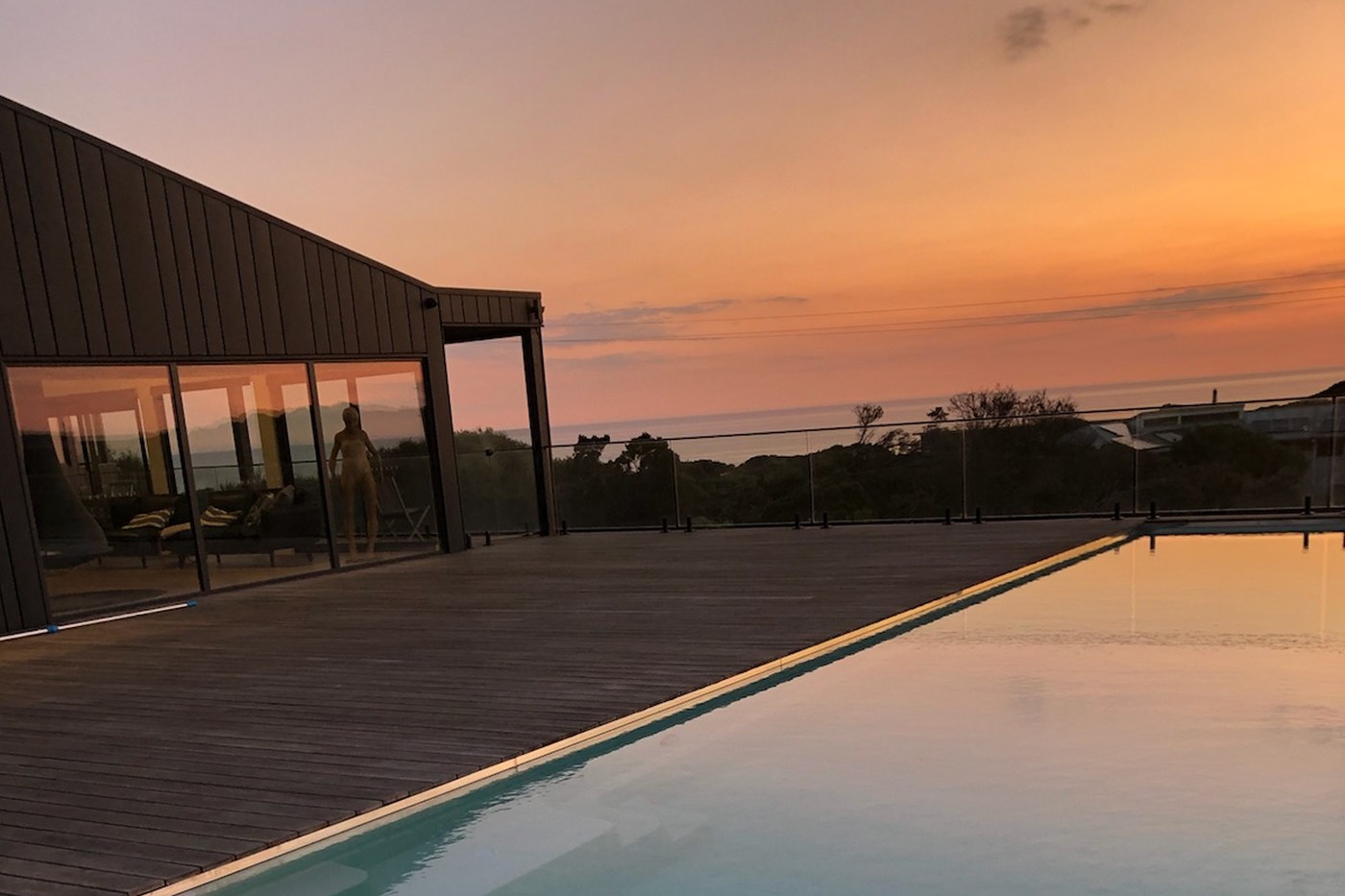 Compass Pools Melbourne 11 8m Xtrainer inifinity pool and spa with 3m Wader Deck and the house detail Compass Pools Melbourne 11 8m Xtrainer inifinity pool and spa with 3m Wader Deck and the house detail